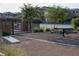 Well-maintained picnic area featuring modern picnic tables, landscaping, and recreational space, ideal for community gatherings at 7037 Tilligerry St, North Las Vegas, NV 89084