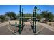 Well-maintained outdoor exercise equipment in a secure community playground offers a great workout area at 7037 Tilligerry St, North Las Vegas, NV 89084