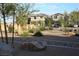 Landscaped street view showcasing well-maintained yards and attractive homes, creating a welcoming neighborhood vibe at 7037 Tilligerry St, North Las Vegas, NV 89084