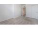 Bright bedroom with neutral carpet and closet with sliding doors at 7124 Sayonara Vista St, North Las Vegas, NV 89084