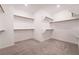 Spacious walk-in closet with multiple shelving units at 7124 Sayonara Vista St, North Las Vegas, NV 89084