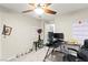 Practical bedroom providing ample space, a ceiling fan, and versatile decor to accommodate various lifestyle needs at 7502 Lush Oasis Ave, Las Vegas, NV 89113