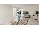 Cozy living room showcasing neutral tones, stylish decor, and an inviting space for relaxation and entertainment at 7502 Lush Oasis Ave, Las Vegas, NV 89113