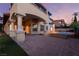Expansive patio with stairs leading to a serene pool, offering a seamless blend of indoor-outdoor living at 761 Romano Ln, Henderson, NV 89012
