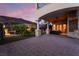 Spacious outdoor patio overlooking the landscaped yard, ideal for outdoor gatherings and relaxation at 761 Romano Ln, Henderson, NV 89012