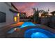 Luxurious backyard with a sparkling pool and spa, perfect for relaxing and entertaining at 761 Romano Ln, Henderson, NV 89012