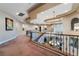 Elegant hallway with decorative railing and recessed lighting on the second floor at 761 Romano Ln, Henderson, NV 89012