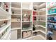 Walk-in pantry with ample shelving provides plenty of room for food storage and organization at 761 Romano Ln, Henderson, NV 89012