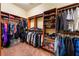 Expansive walk-in closet featuring custom shelving and ample storage space at 761 Romano Ln, Henderson, NV 89012