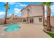 Charming home featuring a private backyard oasis with pool, mature trees, and ample patio space at 8379 Drop Camp St, Las Vegas, NV 89123