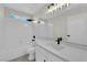 Bright bathroom features modern fixtures, a quartz countertop, and plenty of natural light at 8379 Drop Camp St, Las Vegas, NV 89123