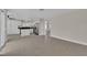 Bright living room with easy access to the kitchen and views of the exterior at 8379 Drop Camp St, Las Vegas, NV 89123