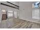 Spacious living room with stairs leading to the second floor and ample natural light at 8379 Drop Camp St, Las Vegas, NV 89123