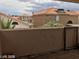 Balcony view of surrounding homes with terracotta roofs at 8769 Country View Ave, Las Vegas, NV 89129