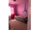 Pink Eiffel Tower-themed bedroom with bed and window with red curtains at 8769 Country View Ave, Las Vegas, NV 89129