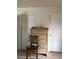 Bedroom with dresser, chair and neutral walls at 8769 Country View Ave, Las Vegas, NV 89129