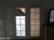 Bedroom featuring french doors and a dresser at 8769 Country View Ave, Las Vegas, NV 89129