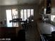 Bright, functional kitchen with granite countertops, wooden cabinets, and modern appliances at 8769 Country View Ave, Las Vegas, NV 89129