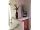 Close-up of decorative ledge on staircase landing with interior decor and storage at 8769 Country View Ave, Las Vegas, NV 89129
