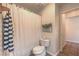 Cozy bathroom with a shower and a toilet at 8800 Crescent Ridge Ln, Las Vegas, NV 89134