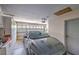 Spacious garage featuring overhead door with windows, built-in cabinets, and parking for vehicles at 8800 Crescent Ridge Ln, Las Vegas, NV 89134