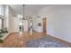 Bright and open living room with natural lighting and hardwood flooring at 8800 Crescent Ridge Ln, Las Vegas, NV 89134