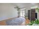 Bright and open living room with sliding glass doors and hardwood floors at 8800 Crescent Ridge Ln, Las Vegas, NV 89134