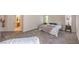 Expansive main bedroom with private ensuite bathroom and serene natural lighting at 8800 Crescent Ridge Ln, Las Vegas, NV 89134