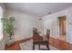 Office room featuring hardwood floors, natural light, and antique writing desk at 8800 Crescent Ridge Ln, Las Vegas, NV 89134