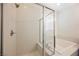 Beautiful bathroom with a glass enclosed shower and soaking tub at 920 Cirrus Cloud Ave, Las Vegas, NV 89138