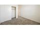 Relaxing bedroom with a closet and gray carpeting throughout at 920 Cirrus Cloud Ave, Las Vegas, NV 89138