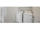 A cozy laundry room featuring white appliances, perfect for convenient laundry at 920 Cirrus Cloud Ave, Las Vegas, NV 89138