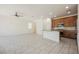 Bright open floor plan with tile flooring that connects seamlessly with a modern kitchen at 920 Cirrus Cloud Ave, Las Vegas, NV 89138