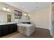 Large primary bathroom featuring a soaking tub, dual sinks, and separate shower at 9240 Northfield Park Ct, Las Vegas, NV 89148