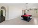 Large game room offering a pool table, ceiling fan, and ample space for entertainment at 9240 Northfield Park Ct, Las Vegas, NV 89148