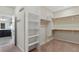 Spacious walk-in closet with shelving and hanging rods at 9240 Northfield Park Ct, Las Vegas, NV 89148