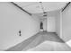 Garage with concrete flooring and an attached water heater and filtration system at 9315 Indian Corn Ct # 101, Las Vegas, NV 89178