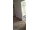 Bathroom featuring a shower over tub with grey wood-look flooring and neutral color palette at 9617 Pine River Ln, Las Vegas, NV 89123