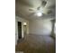 Bedroom featuring a ceiling fan, window and doorway to the closet at 9617 Pine River Ln, Las Vegas, NV 89123