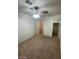 Bedroom featuring carpet, neutral walls and a ceiling fan with attached lighting fixture at 9617 Pine River Ln, Las Vegas, NV 89123