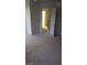 Bedroom with neutral walls, plush carpet, and open doorway to another room at 9617 Pine River Ln, Las Vegas, NV 89123