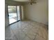 Bedroom with tile flooring and access to outdoor pool area at 9617 Pine River Ln, Las Vegas, NV 89123