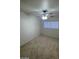 Bedroom featuring a ceiling fan, window, carpeted floor, and neutral color palette at 9617 Pine River Ln, Las Vegas, NV 89123