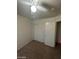 Bedroom with a ceiling fan and a large closet with sliding doors for plenty of storage at 9617 Pine River Ln, Las Vegas, NV 89123