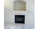 Close-up of the fireplace with tiled surround and a built-in display niche above at 9617 Pine River Ln, Las Vegas, NV 89123