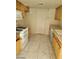 Kitchen features gas range, white appliances, and ample cabinet space at 9617 Pine River Ln, Las Vegas, NV 89123