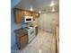 Kitchen features gas range, white appliances, and ample cabinet space at 9617 Pine River Ln, Las Vegas, NV 89123