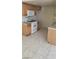 Kitchen features gas range, white appliances, and ample cabinet space at 9617 Pine River Ln, Las Vegas, NV 89123