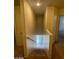 Staircase descending to the lower level, featuring neutral-toned walls and carpeted steps at 9617 Pine River Ln, Las Vegas, NV 89123