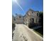 Two-story home featuring manicured yard, attached garage, and private drive in a desirable neighborhood at 9801 Bradford Summit St, Las Vegas, NV 89183